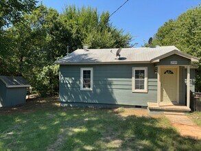 Building Photo - Two bedroom home with over half of acre  o...