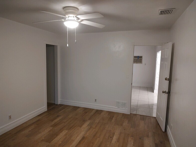 Master bedroom looking at closet and den room - 6449 101st Way N