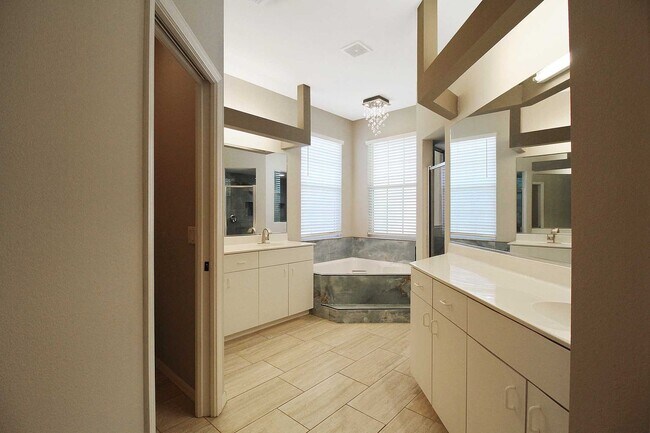 Building Photo - Annual rental: Spacious 3BR/2BA Creekwood Home with Office, Screened Lanai, EV Charger & Resort-S...