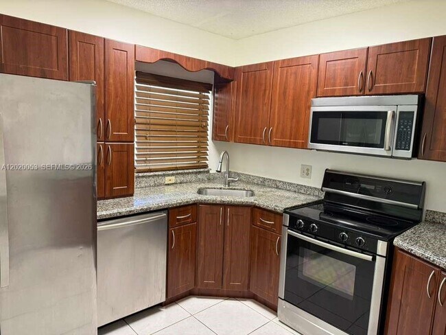 Building Photo - 4484 Carambola Cir S