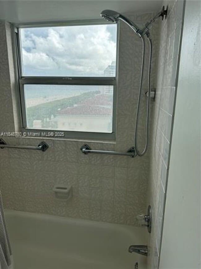 Building Photo - 6039 Collins Ave