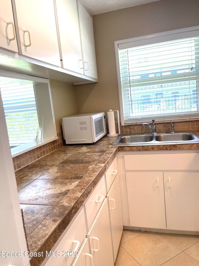 Building Photo - 5600 N Banana River Blvd