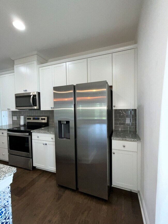 Building Photo - "Spacious 4-Bed Oasis with Stunning Lake V...