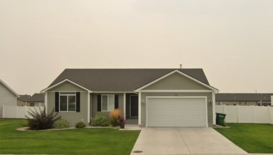 Building Photo - CALL TYE DIRECTLY 208-313-6062. 4 BED 2 BATH HOME WITH ATTACHED GARAGE