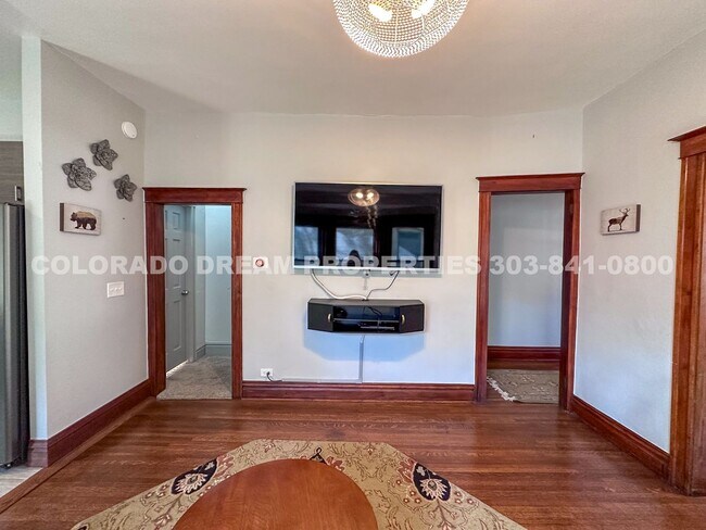 Building Photo - A home where old-world charm meets modern sophistication!