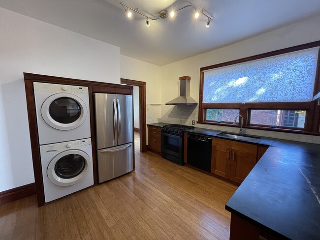 Kitchen with Built in Appliances and Exterior Exhaust Fan - 596 Niagara St