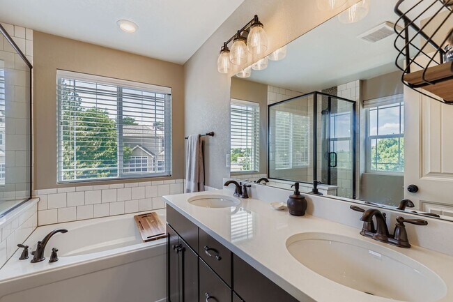 Building Photo - Welcome to this Beautifully Maintained 4-B...