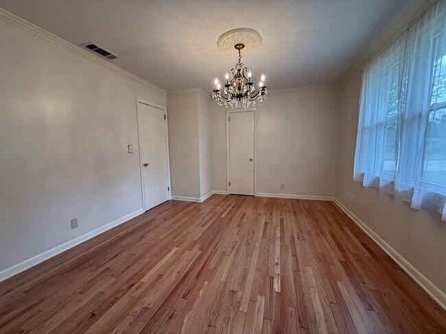 Building Photo - Modern Comforts with Granite & Hardwood Finishes!" 3 Bedroom 2 bath home.