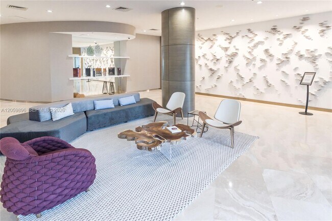 Building Photo - 10275 Collins Ave