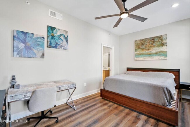 Building Photo - Welcome to your dream condo in the heart o...