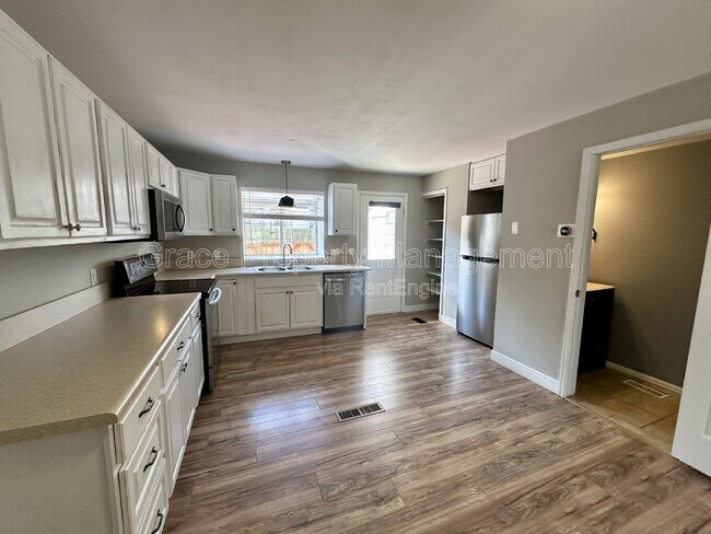 Building Photo - 9616 W Chatfield Ave