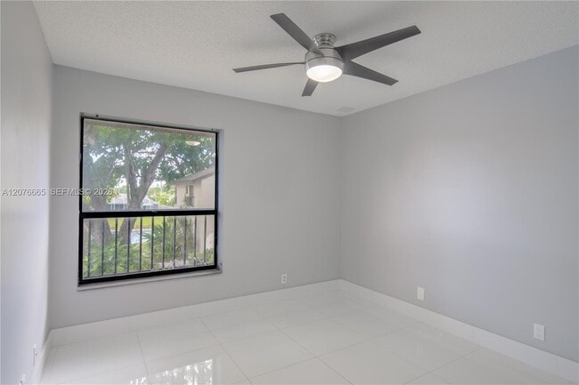 Building Photo - 3745 Cocoplum Cir