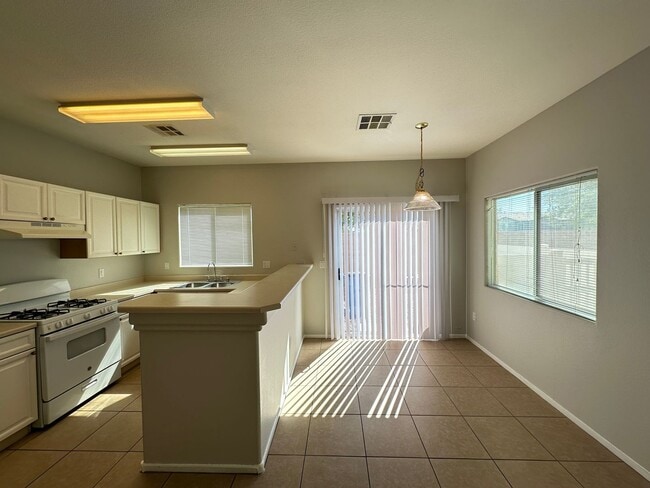 Building Photo - First Light At Arlington Ranch
