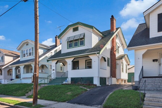 Building Photo - NORWOOD – Stunning Old-World Charm with Modern Comforts