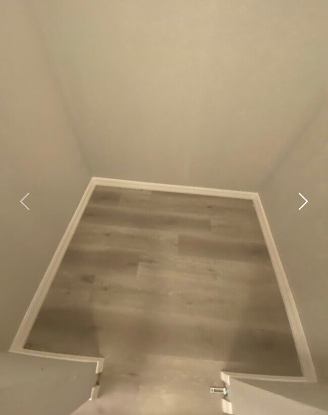 Building Photo - Available NOW! NEW FLOORS AND PAINT! Lovely 3/2 in Poinciana! HUGE fenced yard and NO CARPET!