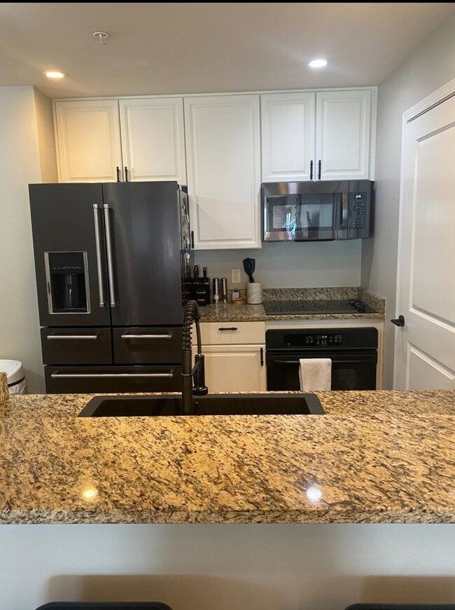 Building Photo - Charming 1BR Condo in Denver