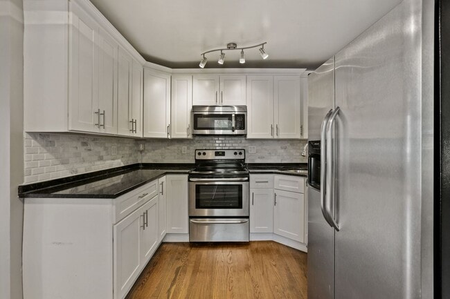 Building Photo - Move-In Ready Cape Cod with 3 Finished Levels & Huge Backyard