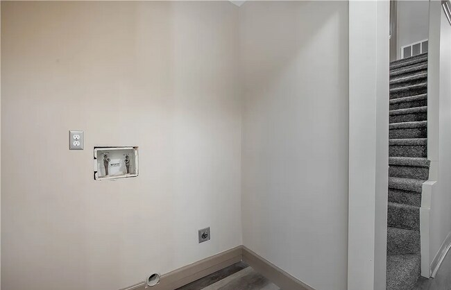 Building Photo - This Charming Two-Story Home Awaits You