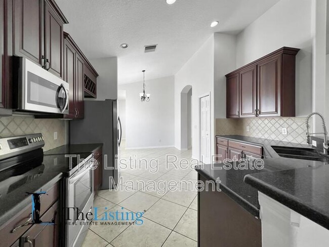 Building Photo - 8814 Sandy Plains Dr