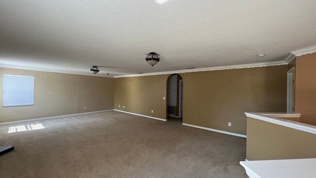 Building Photo - Spacious 4/3.5 Pool Home with Water View & 3-Car Garage in Lee Vista Area (close to Lake Nona)