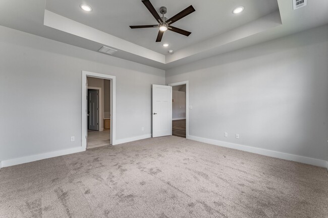 Building Photo - Modern Elegance: Spacious 4-Bedroom New Build with Private Back Porch