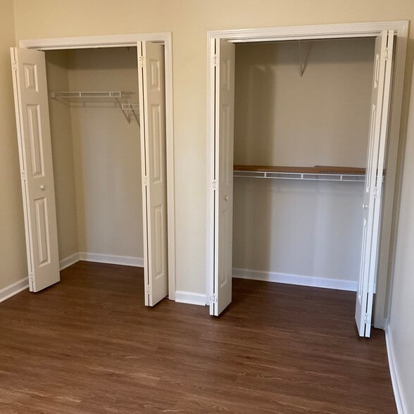 His and hers closets in second bedroom. - 10 Hillsboro Dr