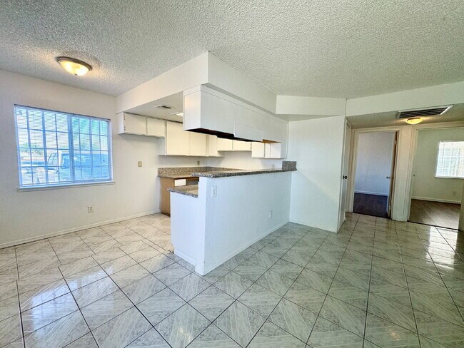 Building Photo - DOWNSTAIRS CONDO | RECENLY REHABBED 2 BEDROOM 1 BATH | ACROSS FROM CSN CHEYENNE