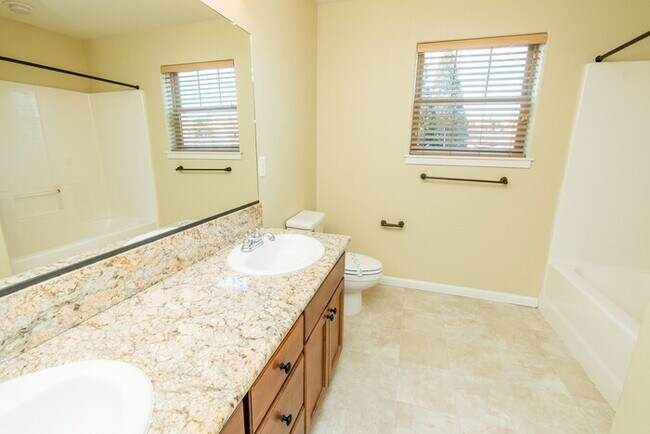 Building Photo - Spring Into Your New Home - Premium Corner Townhome Now Available!