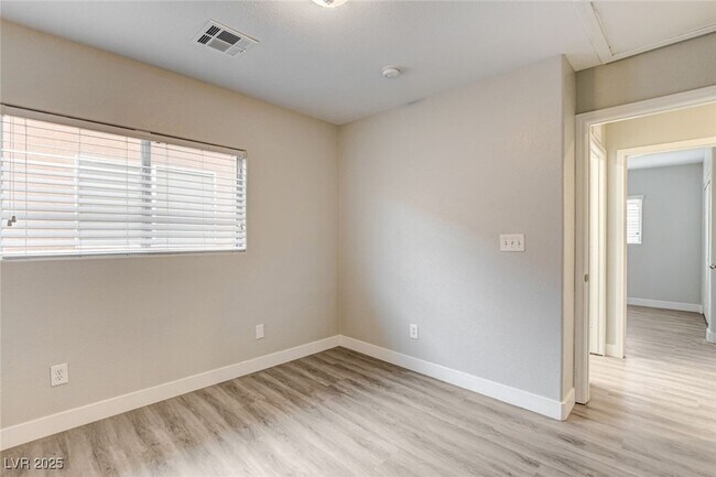 Building Photo - 9060 Candyland Ave