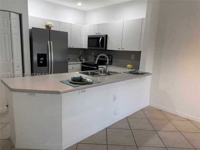 Building Photo - 5743 NW 114th 106