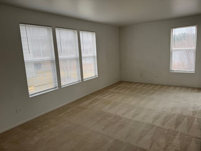 Building Photo - Partially Furnished - Bright & Spacious 2BR/1.5 BA CONDO - End-Unit w/ 2-Car Garage, Appliances, ...