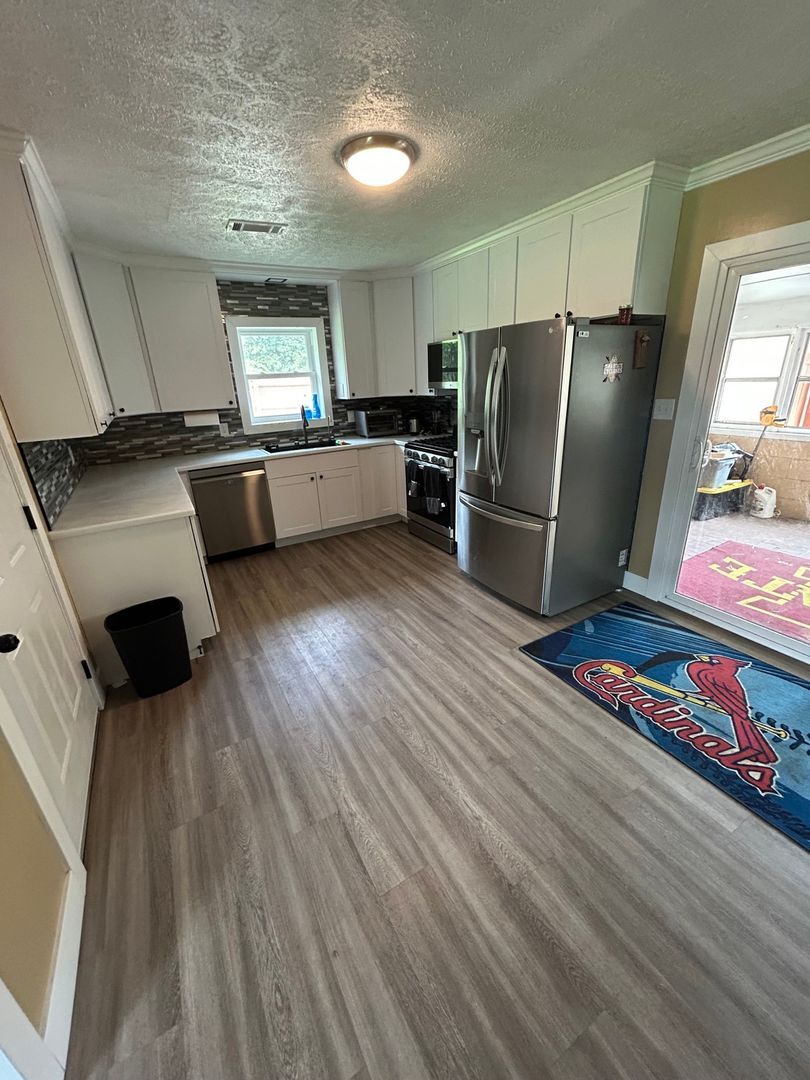 Building Photo - 1230 S Rogers St