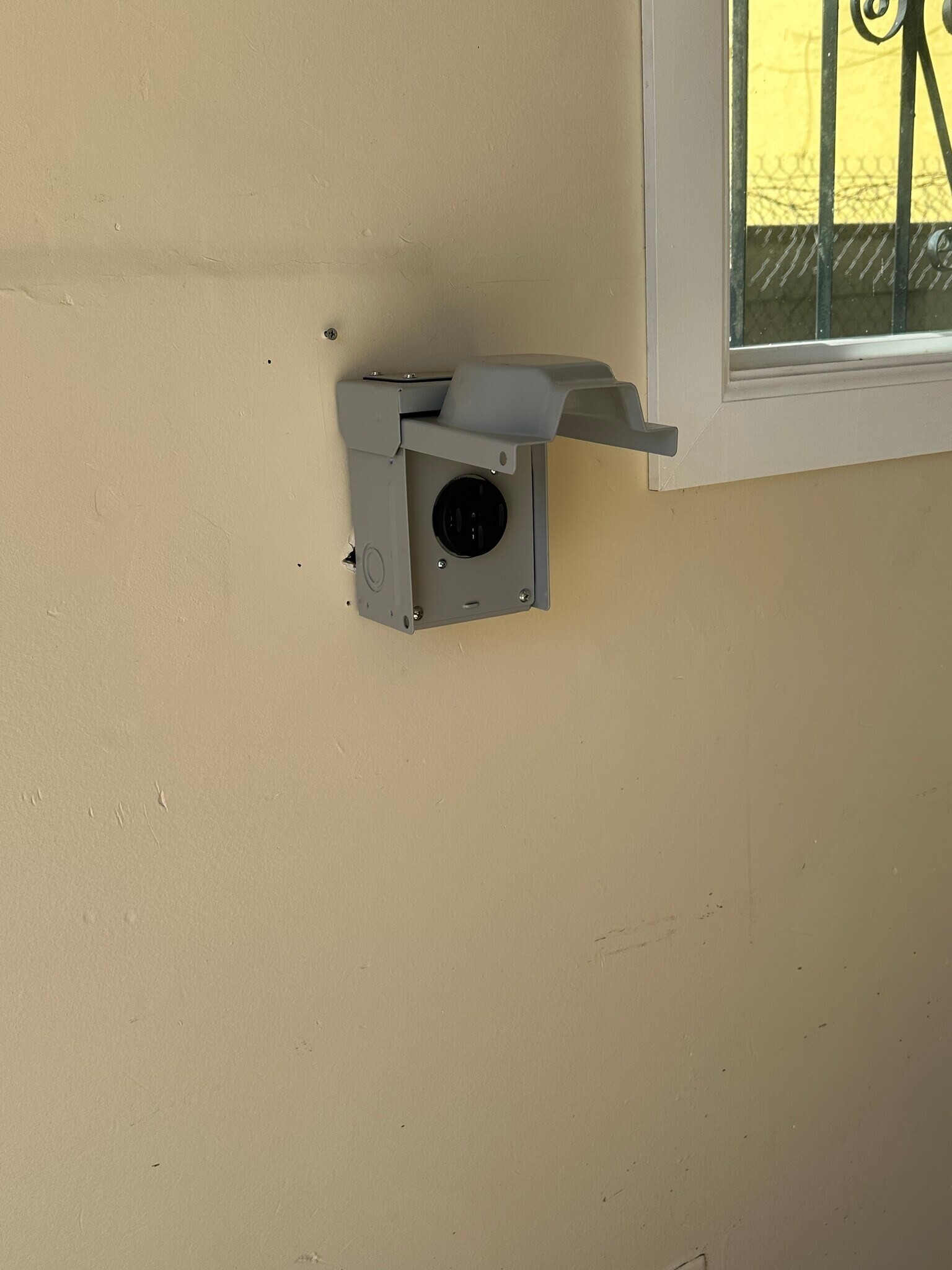 Plug to charge an EV in the garage. - 552 Brooks Ave