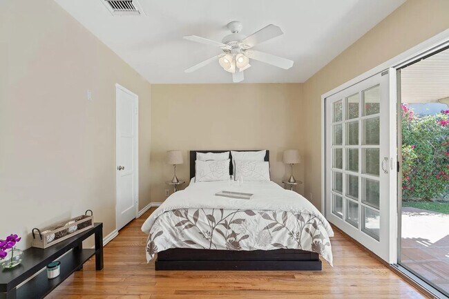 Master bedroom with french doors - 14024 Peach Grove St