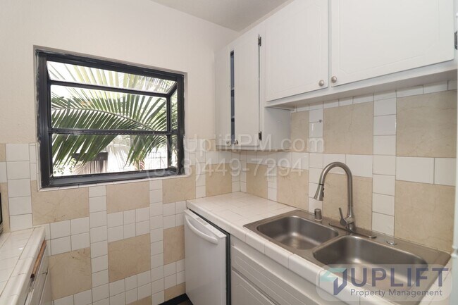 Building Photo - 2-bedroom, 2-bathroom home in a gated comm...