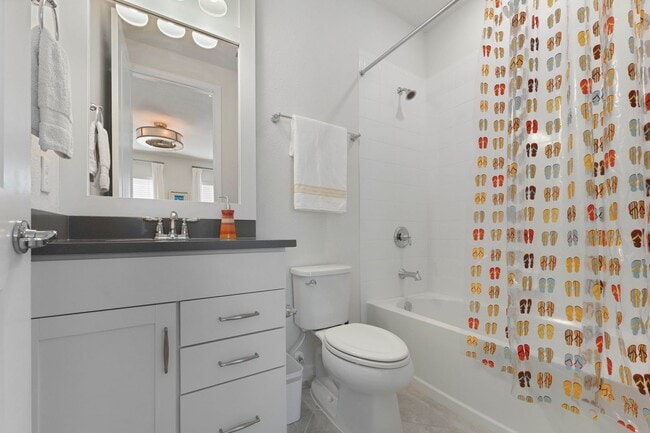 Building Photo - Introducing a captivating 3-story townhome...