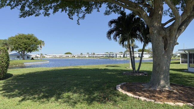 Building Photo - Lakefront 2BR Home in 55+ Leisureville Community