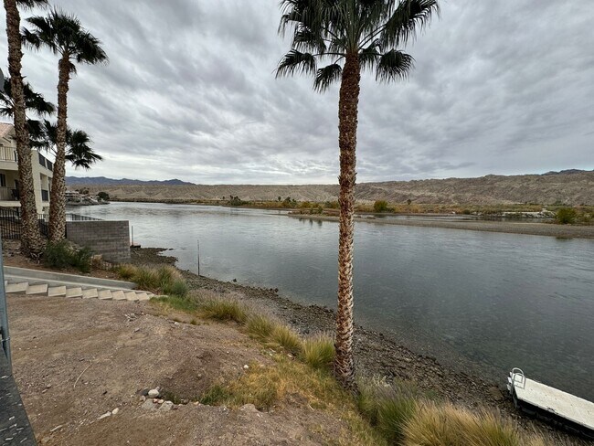 Building Photo - 2 BR Furnished Condo on the Colorado River with Utilities included