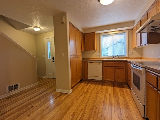 Building Photo - Beautiful 2-Bedroom, 1.5-Bath Condo. Landscaping included!
