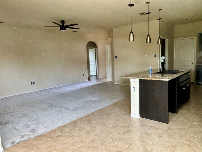Building Photo - COMING SOON! Greenbelt Views & Giant Yard — Freshly Painted 4BR in Golden Pond