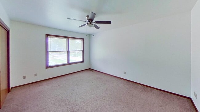 Building Photo - Two story duplex with two large bedrooms, walk in closet, one and a half bath, full basement.