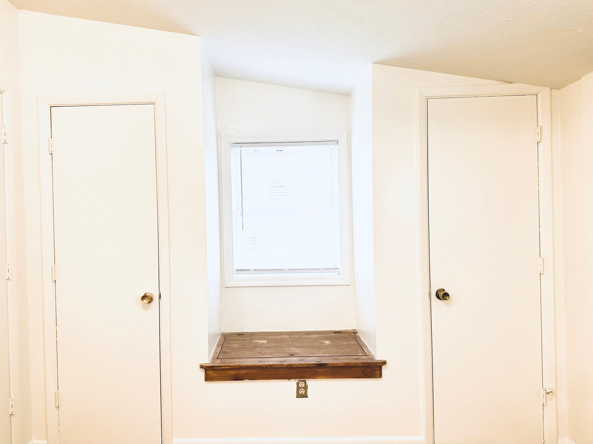 bedroom closets and window - 1105 S Rogers St
