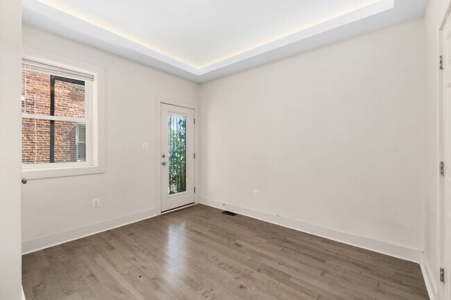 Building Photo - Experience stunning design and modern finishes in Columbia Heights!