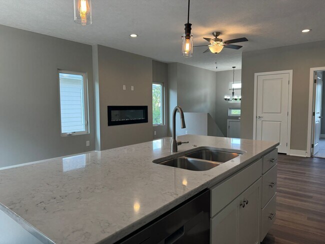 Building Photo - Luxury Bennington Townhome Ready For Move In