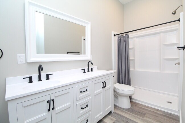 Building Photo - Fully Remodeled 2BR/2BA Attached Home with Garage, Modern Finishes, Park Views & Prime Downtown P...