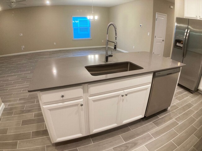 Building Photo - Your Private Escape with High-End Finishes...