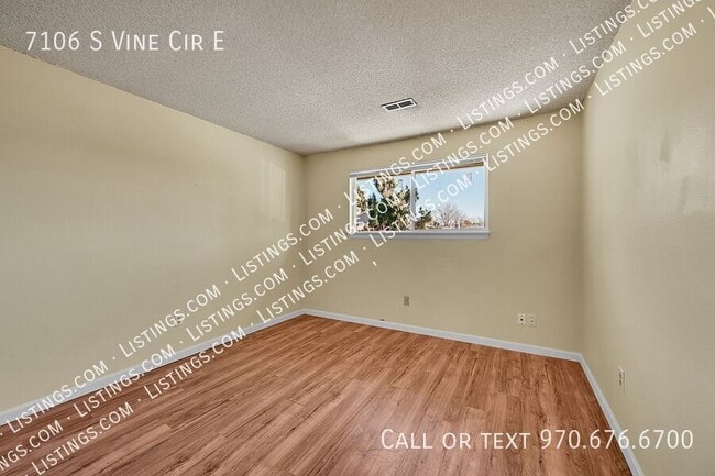 Building Photo - 7106 S Vine Cir E