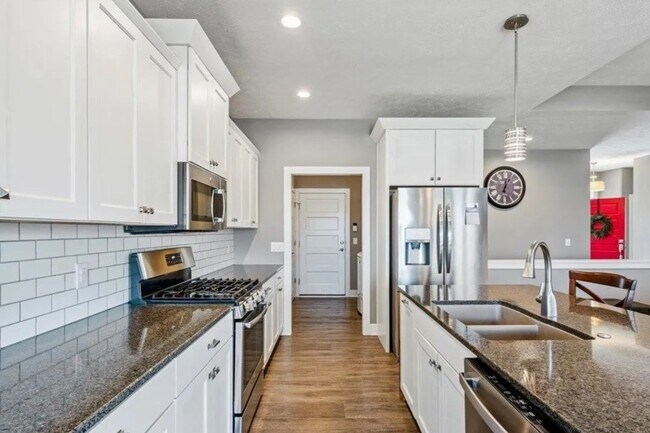 Building Photo - Waterfront Home in Buccaneer Bay with 3-Car Garage & Walkout Basement