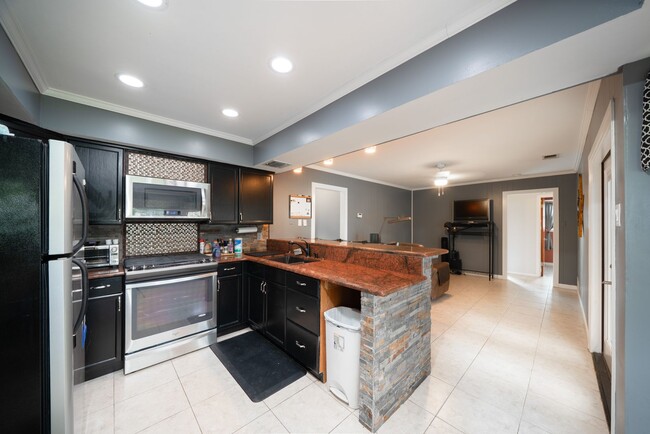 Building Photo - Updated 3-Bedroom Home with Private Yard &...