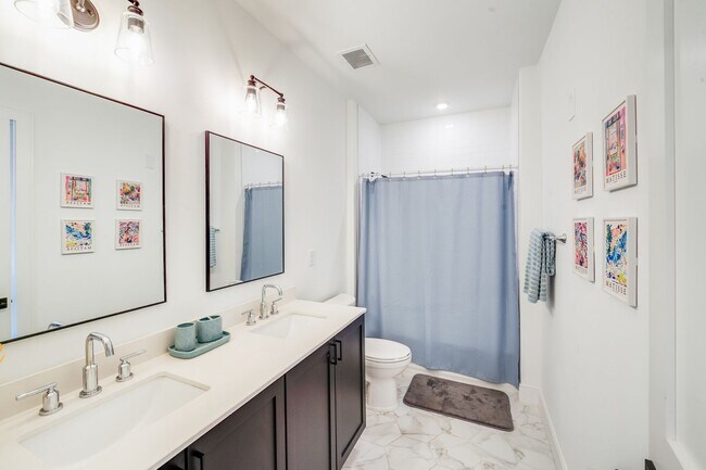 Building Photo - Chic Fully Furnished Condo with Private Retreat-Style Primary Suite